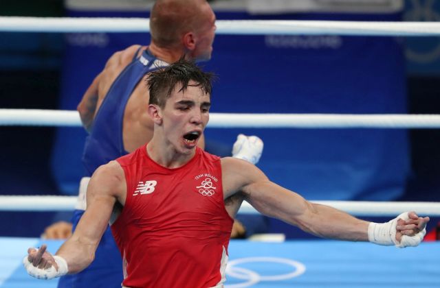 Aug 16, 2016; Rio de Janeiro, Brazil; Michael John Conlan (IRL, red) reacts after his fight against Vladimir Nikitin (RUS, blue) in a men's bantamweight quarterfinal bout at Riocentro - Pavilion 6 during the Rio 2016 Summer Olympic Games. Mandatory Credit: Jason Getz-USA TODAY Sports