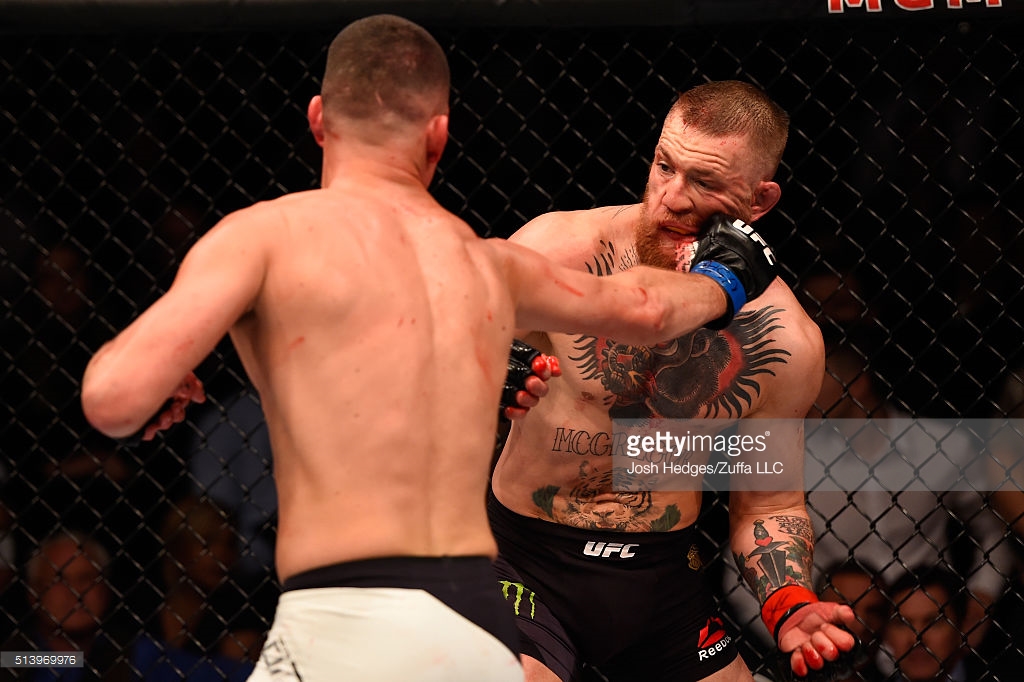 in their welterweight bout during the UFC 196 event inside MGM Grand Garden Arena on March 5, 2016 in Las Vegas, Nevada.