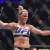 Nov 15, 2015; Melbourne, Australia; Holly Holm (blue gloves) celebrates after defeating Ronda Rousey (not pictured) during UFC 193 at Etihad Stadium. Mandatory Credit: Matt Roberts-USA TODAY Sports